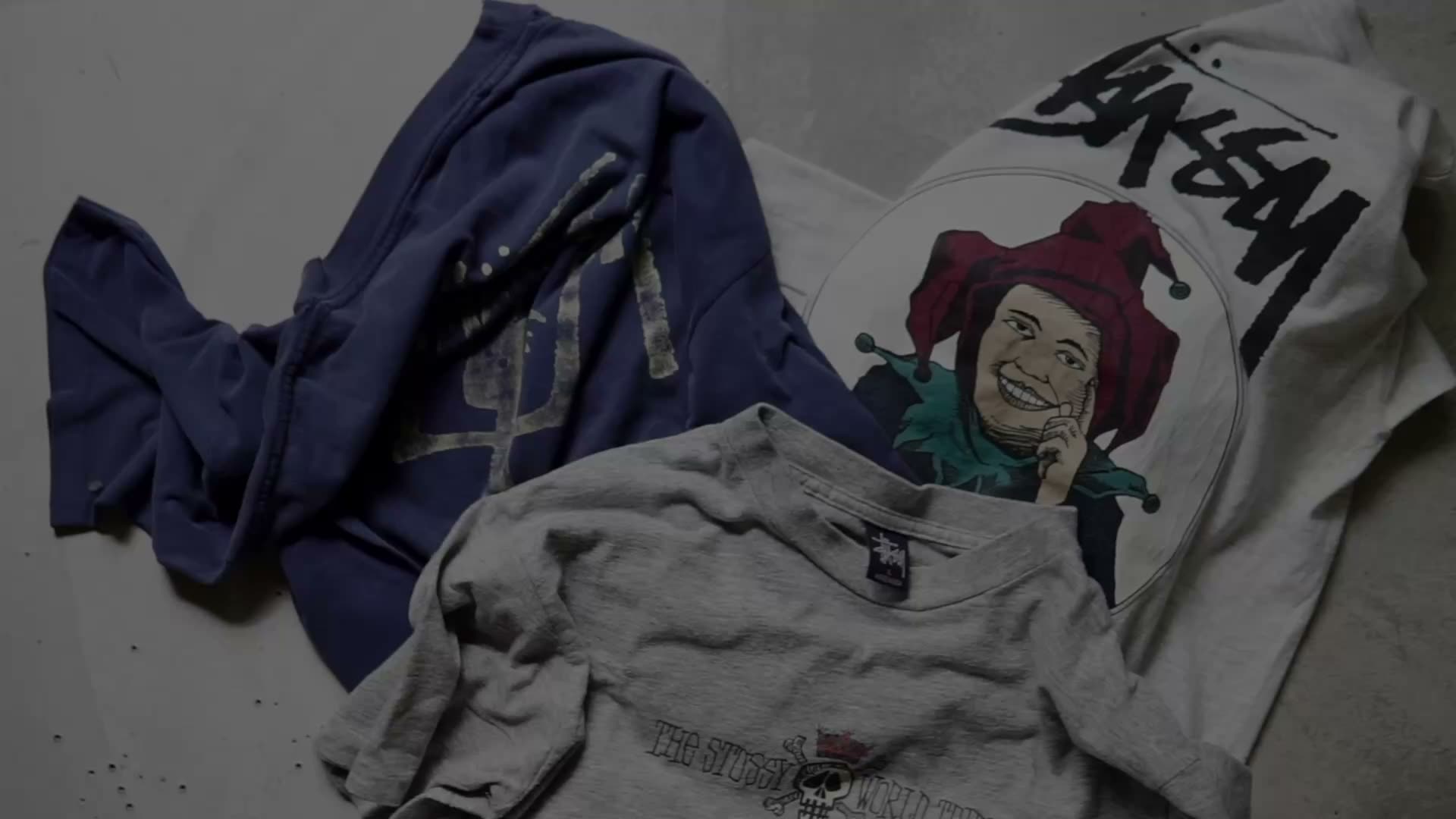 Inside the shop, each garment being checked and arranged by hand